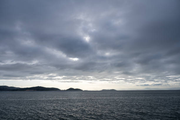 istock At dusk, a passenger ship sailed on the blue waves. 1502802086