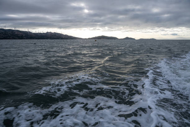 istock At dusk, a passenger ship sailed on the blue waves. 1502802154