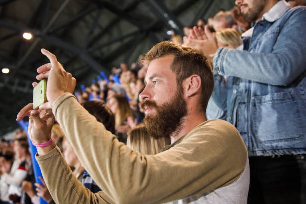 istock Man photographing at a footbal match 1502802259
