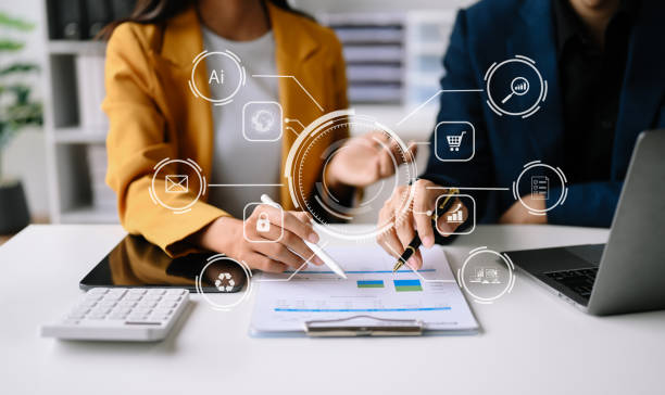 istock Working team meeting concept, business using laptop and smart phone and digital tablet computer with digital marketing media  in virtual icon network diagram office 1502806946