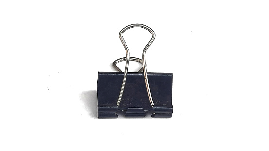 a Metal binder clip, on a white or isolated background