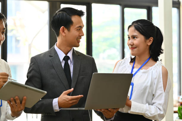 istock Millennial businessman team leader explaining project details, talking about company strategy and business plan during meeting. 1502829614