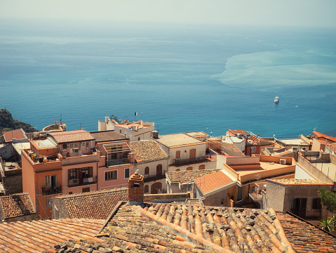 View of Castelmola houses and the mediterranean sea Sicily Italy