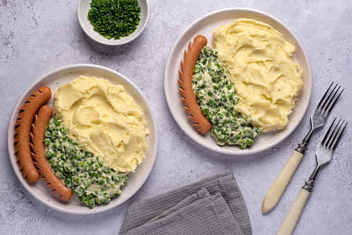 Food photography of mashed potatoes, sausage, green peas, chive, dinner, lunch, brunch, breakfast