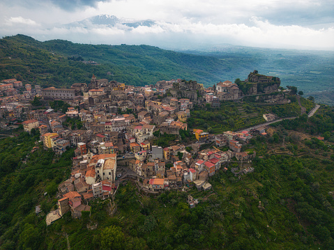 area view of the city of Volterra in Tuscany shrouded in fog