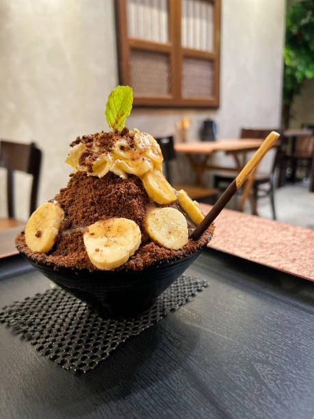 Shaved Ice Dessert Topped with Chocolate, Banana and Syrup, Penang, Malaysia