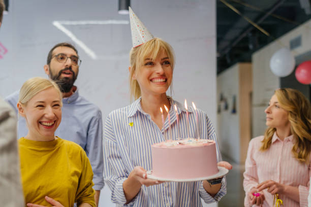 istock Celebrating a birthday in the office 1502843433