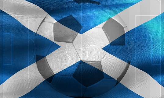 The flag of Scotland with a soccer ball.