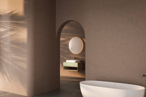 istock Soft natural light blended with natural materials for a relaxing and sophisticated minimal bathroom has marble basin, oval mirror, toilet, bidet, arch, trend. 3d rendering 1502848019