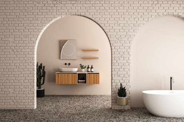 istock Modern mid century and minimalist bathroom interior, beige brick decor concept, modern bathroom cabinet, bathtub and plants with beige wall on concrete floor, arches. 3d rendering 1502853100