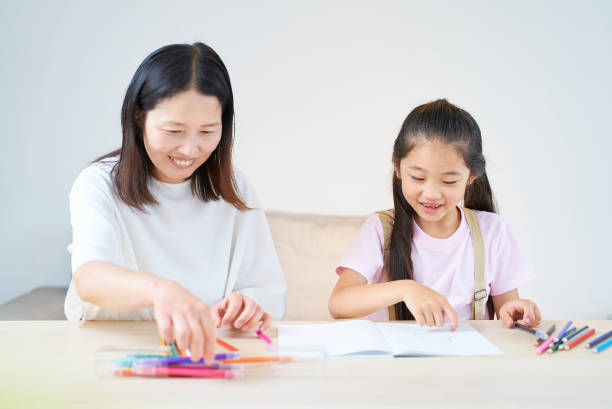 istock Parent and child playing and drawing 1502853839