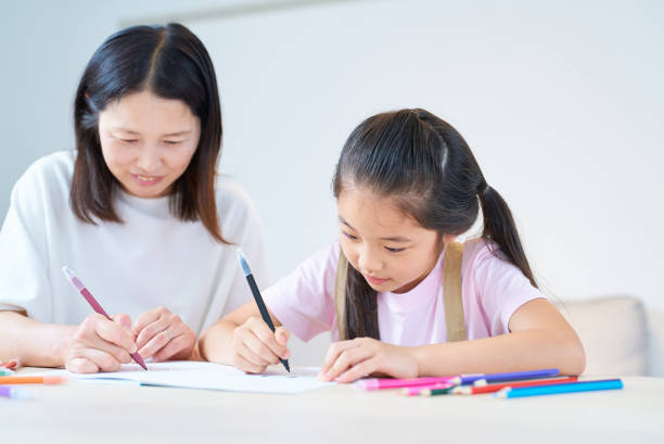 istock Parent and child playing and drawing 1502854013