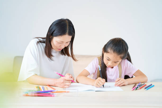 istock Parent and child playing and drawing 1502854273