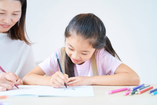 istock Parent and child playing and drawing 1502854316