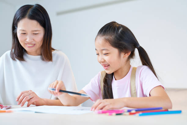 istock Parent and child playing and drawing 1502854932