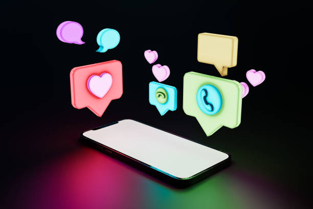 istock Mobile phone under colorful speech bubbles against black background. 3d render 1502860627