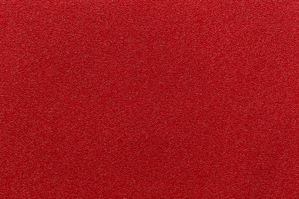 pelle rossa e uno sfondo strutturato. - car leather hide seat foto e immagini stock