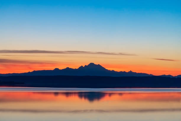 istock Morning sunrise stratovolcano Mt Baker in Cascades Mountain range 1502865730