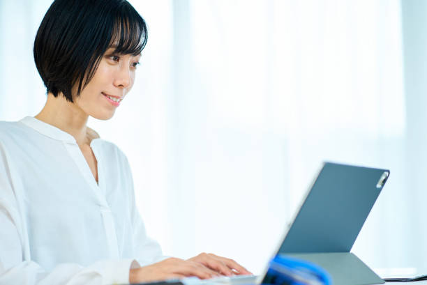 istock woman using laptop in the room 1502867025