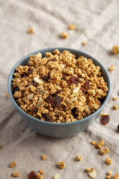 istock Homemade Granola with raisins and almonds  in a Bowl, side view. 1502869264