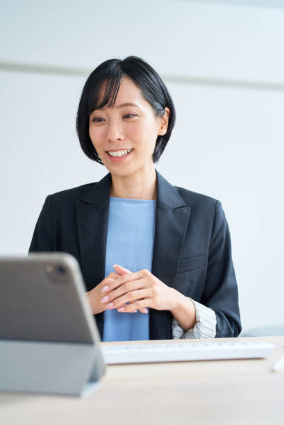 istock Businesswoman using tablet pc for online communication 1502872833
