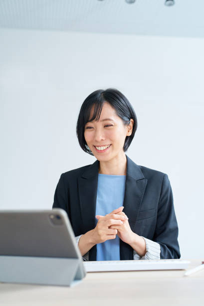 istock Businesswoman using tablet pc for online communication 1502873069