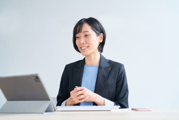 istock Businesswoman using tablet pc for online communication 1502873169