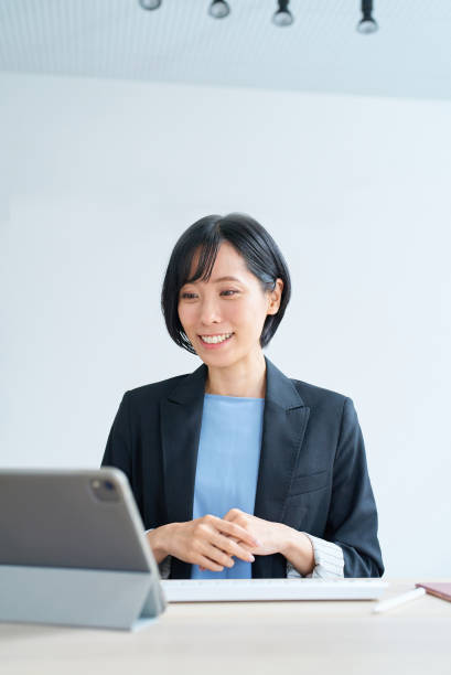 istock Businesswoman using tablet pc for online communication 1502873469