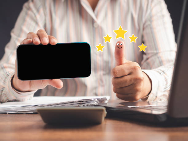 istock Hand with thumb up for smiley face icon. Best excellent services for satisfaction clients giving a five-star rating 1502875202