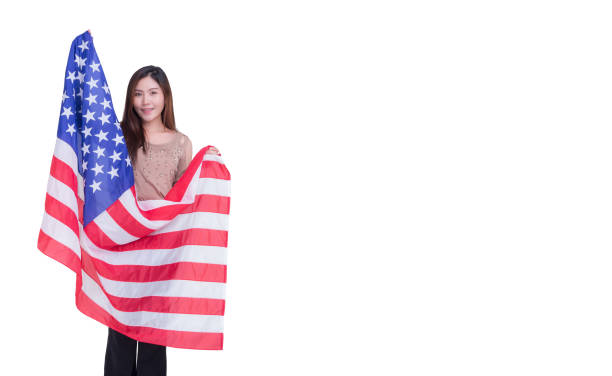 istock Woman holding USA flag with white background 1502875587
