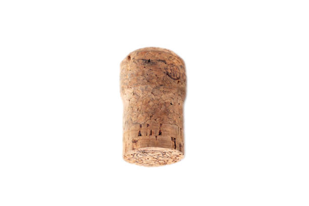 istock Wine and chapagne corks with a corkscrew and a glass bowl in the background, 1502879705