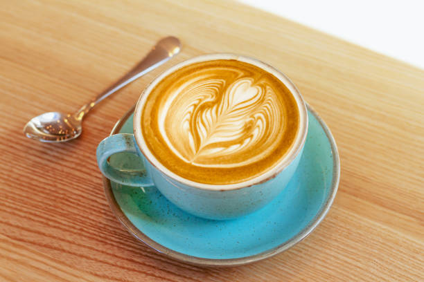 istock Cup of cappuccino latte with art frothy foam 1502879995