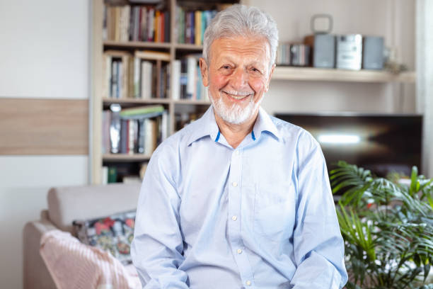 istock Portrait of an elderly gentleman on his sofa 1502880056