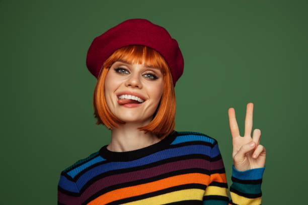 A cartoonish woman with red hair and a red nose stands in front of a blue. 3D render illustration for advertising and the web