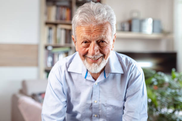 istock Portrait of an elderly gentleman on his sofa 1502881187