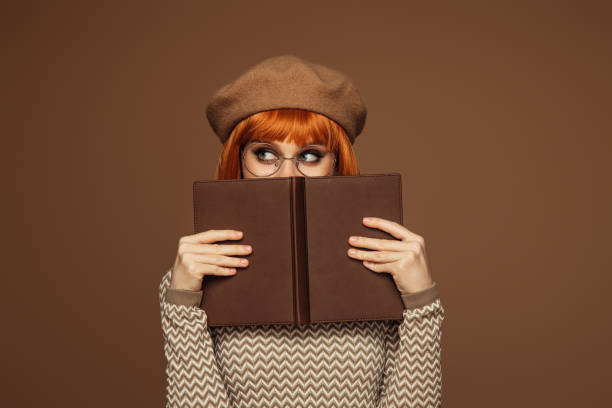 Beautiful girl enjoying a book