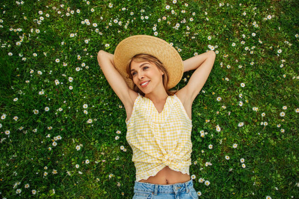 istock Smiling young woman enjoying summer 1502882423
