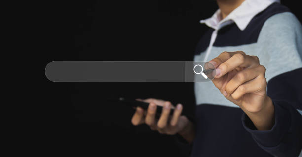 istock Searching the internet with a search bar working on a smartphone, internet network concept. 1502884008