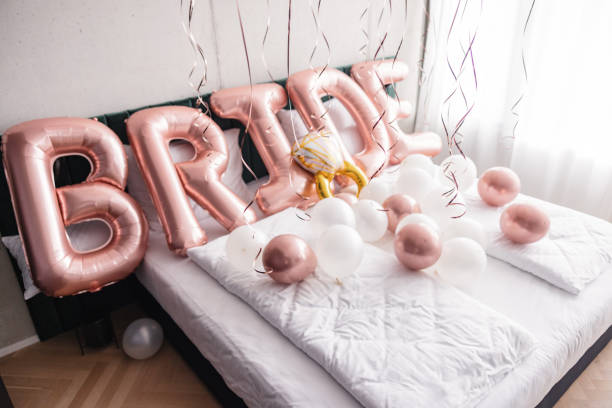 istock 'Bride' balloon decorations on the bed before a bachelorette party 1502885127