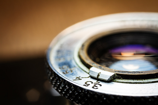 Macro of retro photo camera detail. Selective focus. Shallow depth of field.