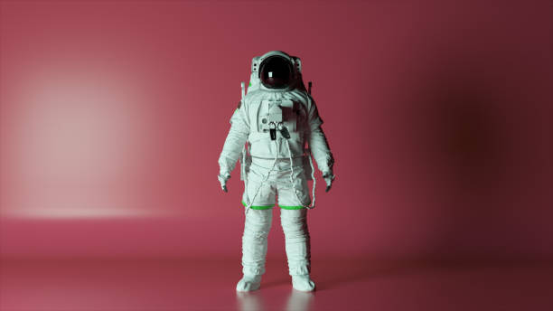 istock Abstract space concept. The astronaut stands on a pink isolated background with changing lighting. Chroma key. Helmet 1502890089