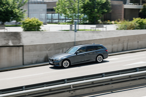 Santander, Spain - 22 June 2023: A BMW 3 Series Touring in motion in Santander, Spain