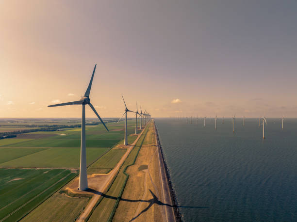 istock Wind turbines in an offshore wind park during springtime seen from above 1502903793