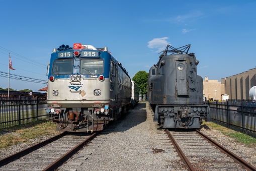 Strassburg P, United States – April 24, 2023: A scenic view of the Strassburg railroad with a selection of vintage trains in the foreground