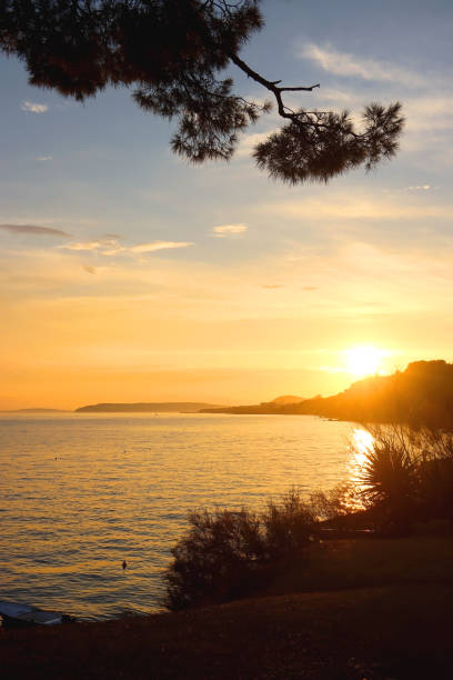istock Sunset and Small Fishing Boat 1502915847