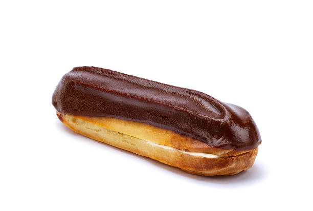 istock Traditional french dessert. Isolated eclair with custard and chocolate icing on white background. Pastry products for sweet tooth 1502916249