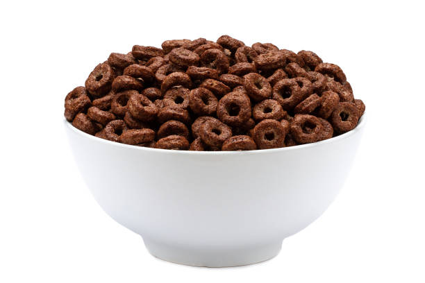 istock Isolated bowl with chocolate brown rings on a white background for dry, cereal breakfast 1502916308