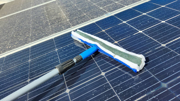 istock Cleaning dirty solar panels. Maintenance 1502923650