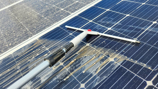 istock Cleaning dirty solar panels. Maintenance 1502923658