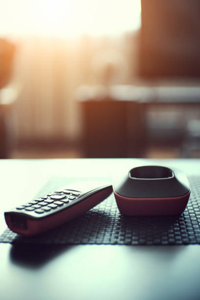 istock Vintage wireless telephone and it's base on table 1502925902